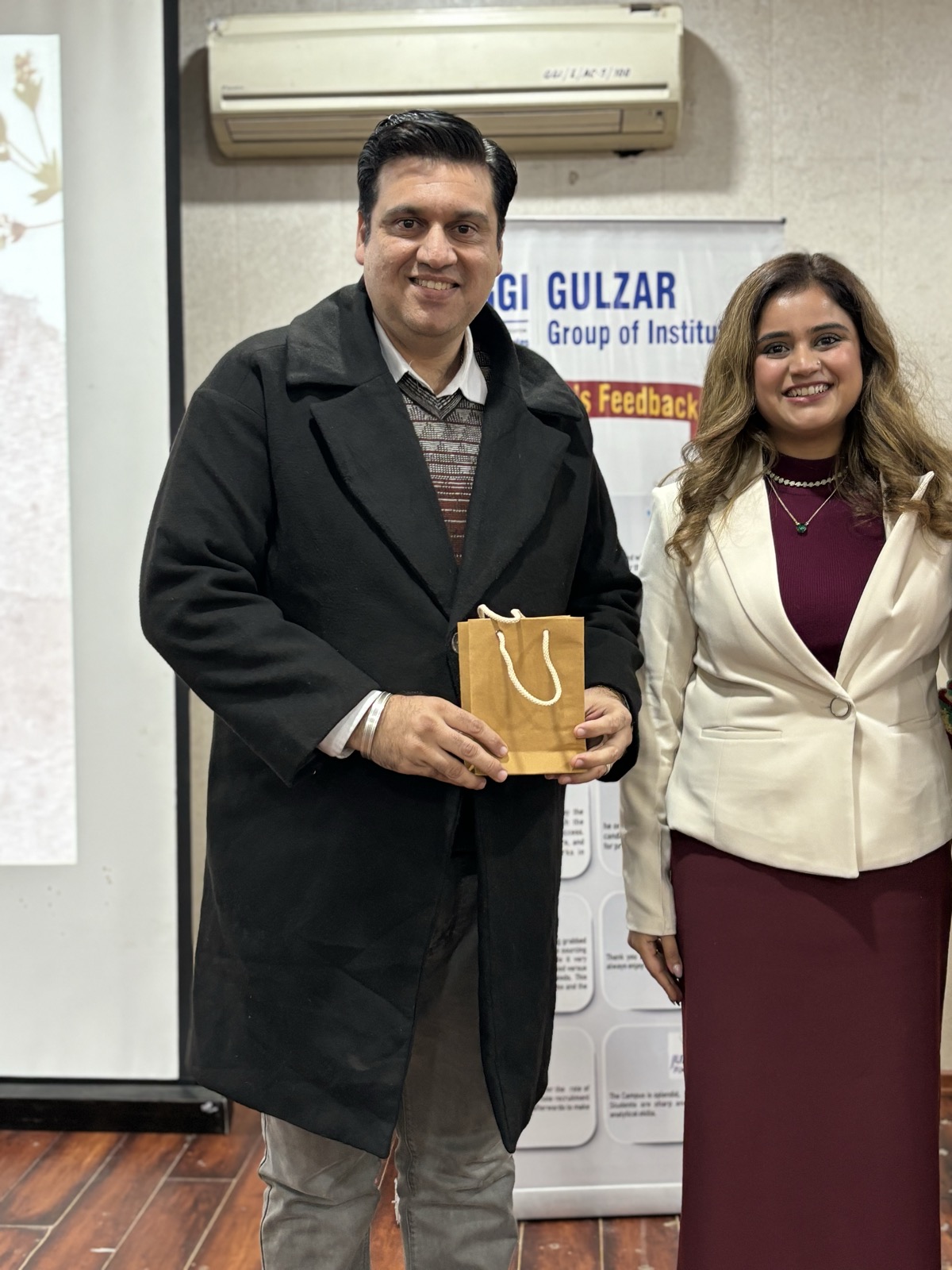 Coach Shavy Jain receiving a token of appreciation from Gulzar Group of Institutes