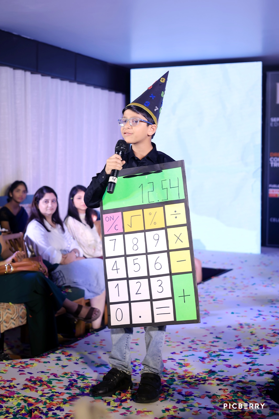 Student in a creative classroom costume presentation